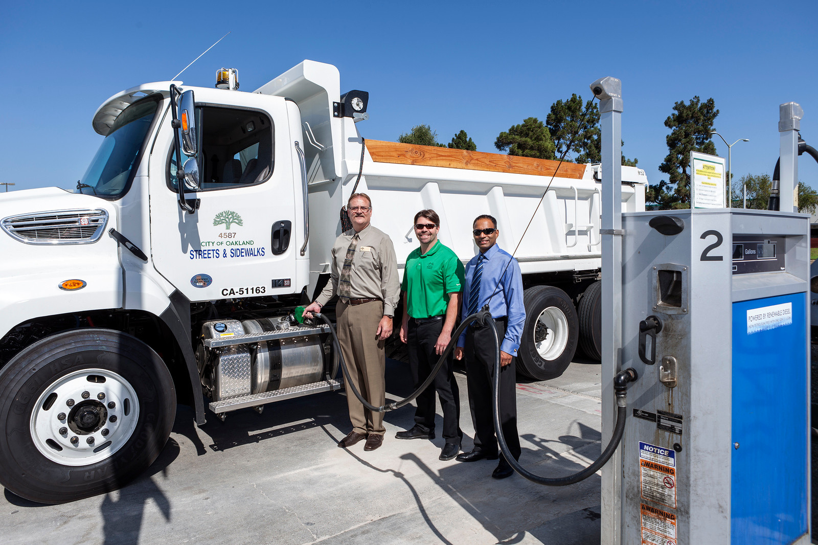 (From left to right): Richard Battersby, City of Oakland, CA, and East Bay Clean Cities Coalition; Pat O’Keefe, Golden Gate Petroleum; and Neville Fernandes from Neste are pictured after the City of Oakland announced its switch to renewable diesel.